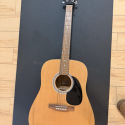 Rogue RA-100D Dreadnought acoustic guitar.
