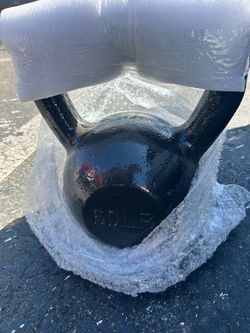 2 brand new 60 pound kettlebells