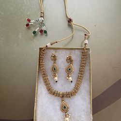 Set Of Elegant Necklaces And Earrings 