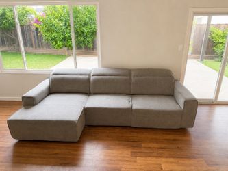 Vaughn 120" 2 Piece Sliding Seat Sectional with Left Arm Facing Chaise and Adjustable Headrests