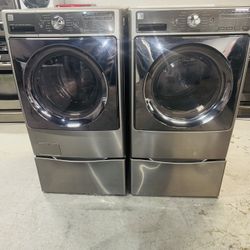 Kenmore electric washer and dryer—includes a receipt for a 90-day warranty.