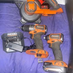 Rigid Impac, Drill, Blower And Charger Plus One Battery