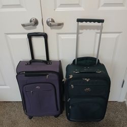 Two Travel Size roller Suitcases 