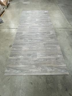 Rolled Vinyl Flooring In Grey Wood