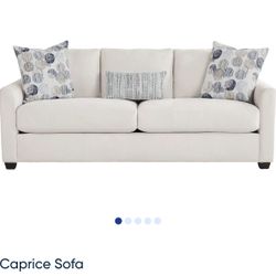 New Ivory Upholstered Sofa (with additional Pillows)