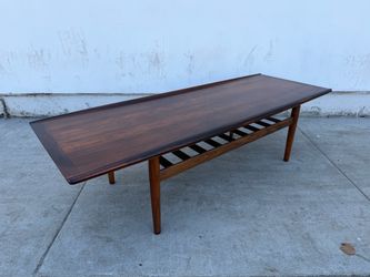 Mid century danish sculpted rosewood coffee table.