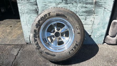 One Cragar SS Reversed Offset 14 Inch Chrome Wheel and Old tire, Fits classic 5 Lug cars
