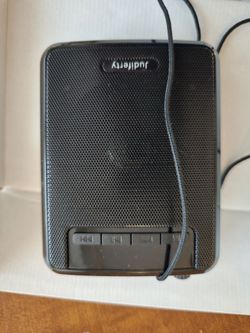 Portable voice amplifier and radio