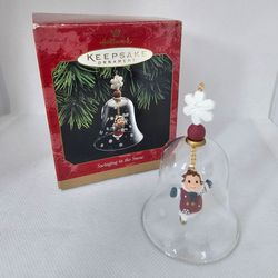 New Hallmark Swinging In Snow ornament Glass Bell Ice Skate skating angel Christmas 

Brand new Ornament,  never displayed 
Box has some light wear du