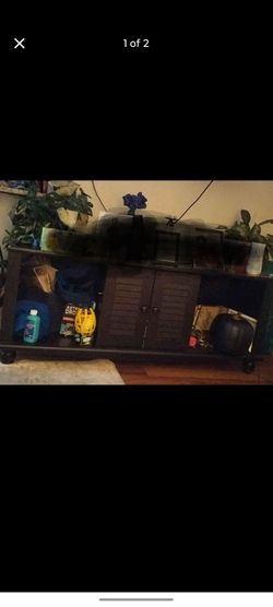 Dark brown TV stand with storage