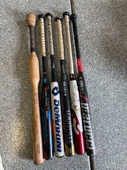 Various softball bats