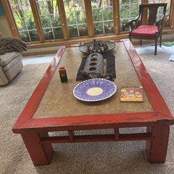 Antique Chinese Early 20th Century Red Lacquer Coffee Table with Hand-Woven Rattan Top
