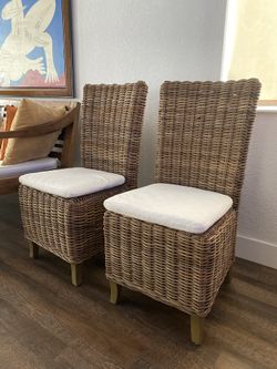 Two pre-owned original and discontinued RH handwoven rattan  Provence High Back Side Chairs with its cushions.