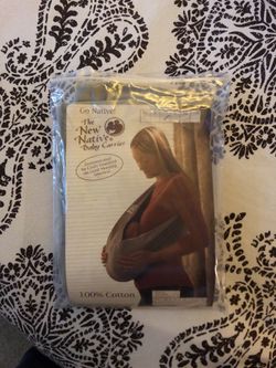 Brand new never used -baby carrier. Size M