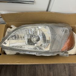 Toyota Echo Headlights Lamp 2000 2001 2002 Halogen - driver side - (left )