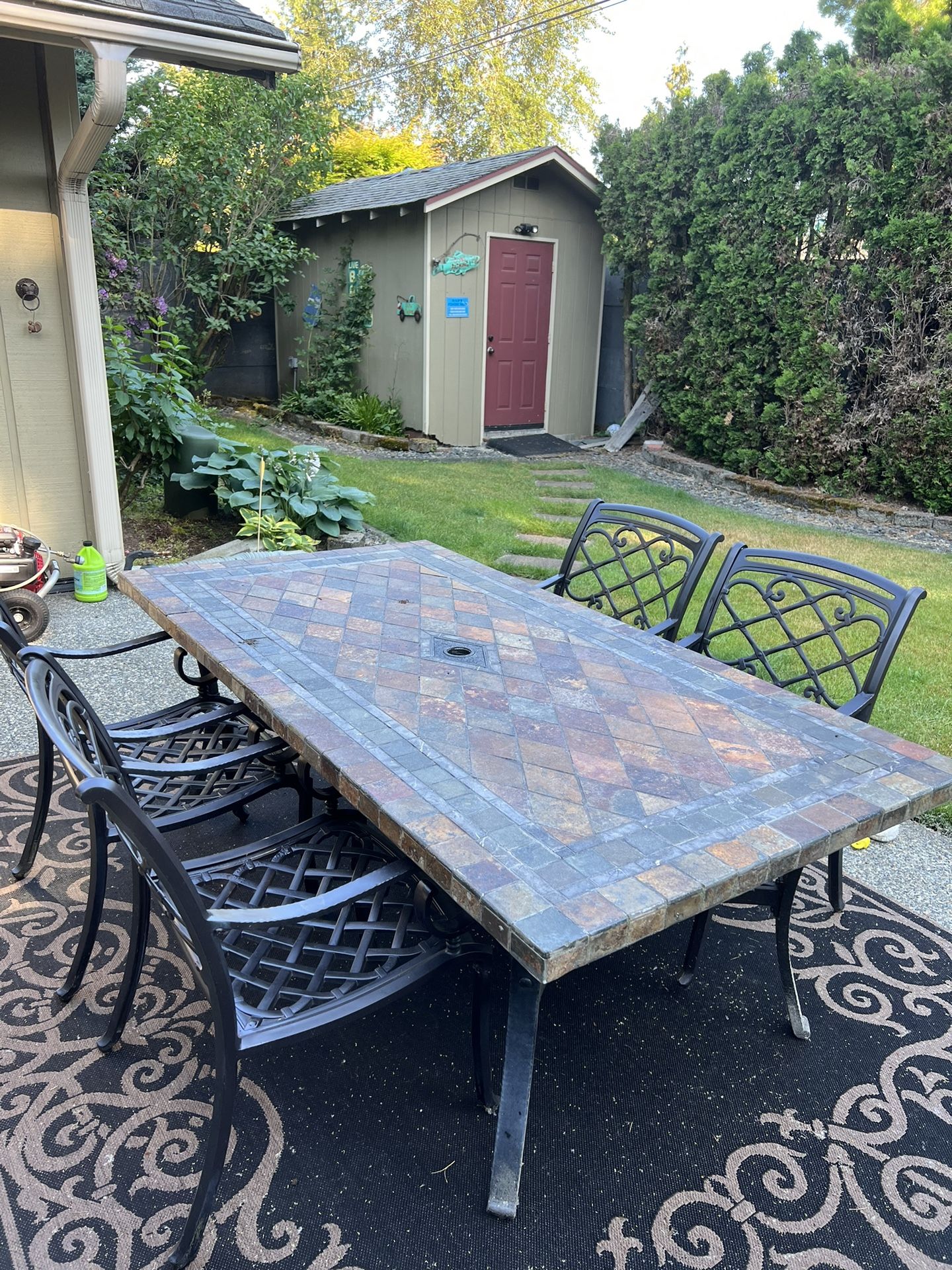 Slate Patio Table With Six Chairs.