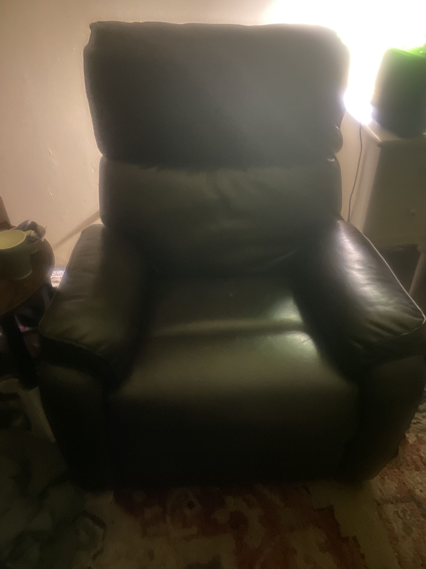 Extra large, swivel/rocker/fake leather recliner brand new