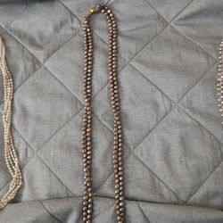 Long brown pearl necklace