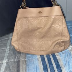 Pink Coach hobo bag