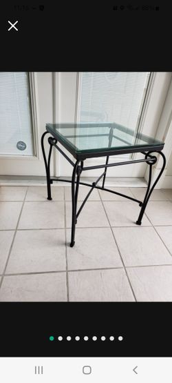 Pier 1 Black Wrought Iron Base and Glass Topped Table.2 foot tall (or 24 inches). Glass 20x20.