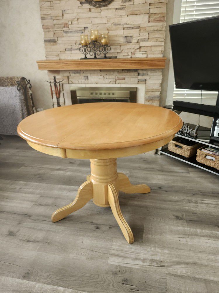 Wood Pedestal Dining Table