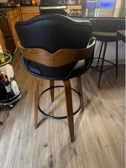 Black Leather and brown barstools