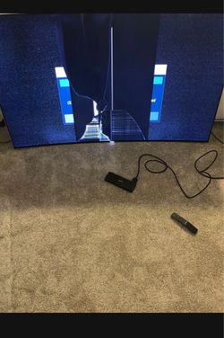 Fairly used samsung 65inch curved QLED with a cracked screen during move. Retail price $2500