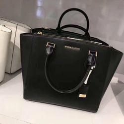 Michael Kors MK handbag with handle and long strap