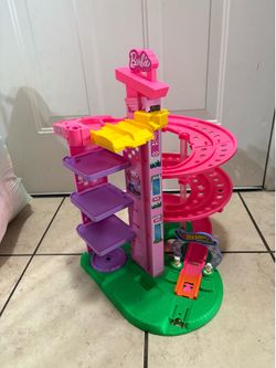 Barbie dream house and Barbie hot wheels toy