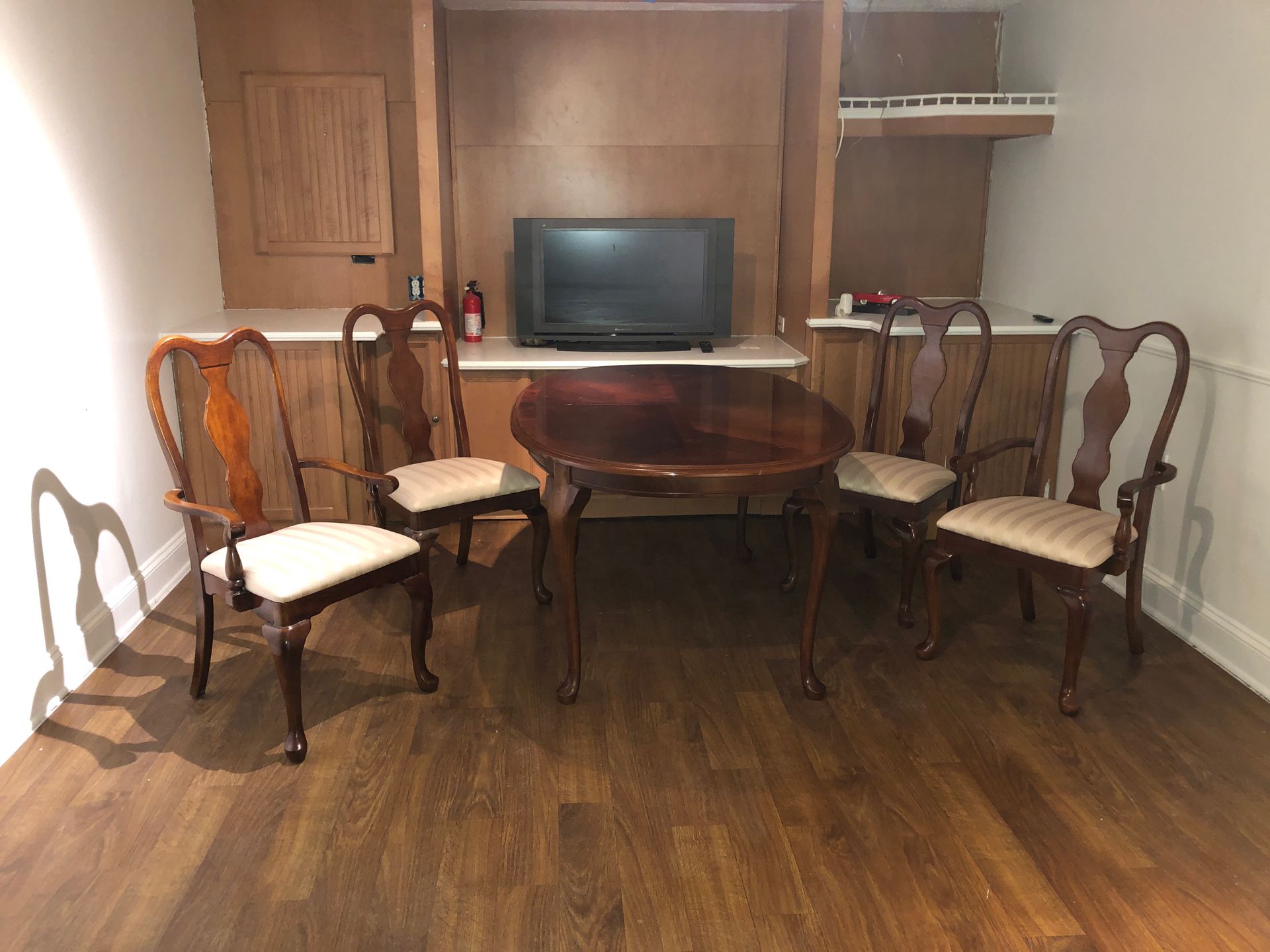 Full dining room set, fine wood, it has matching chest