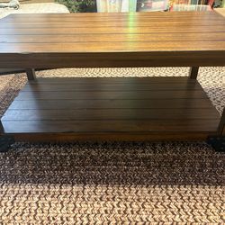 Wood coffee table with metal accents