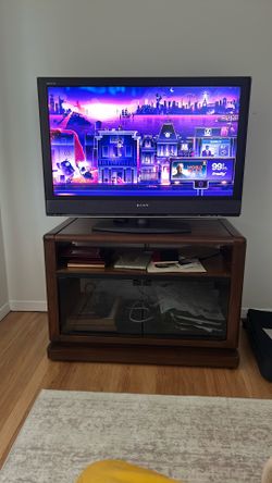 Free TV Stand on wheels all wood