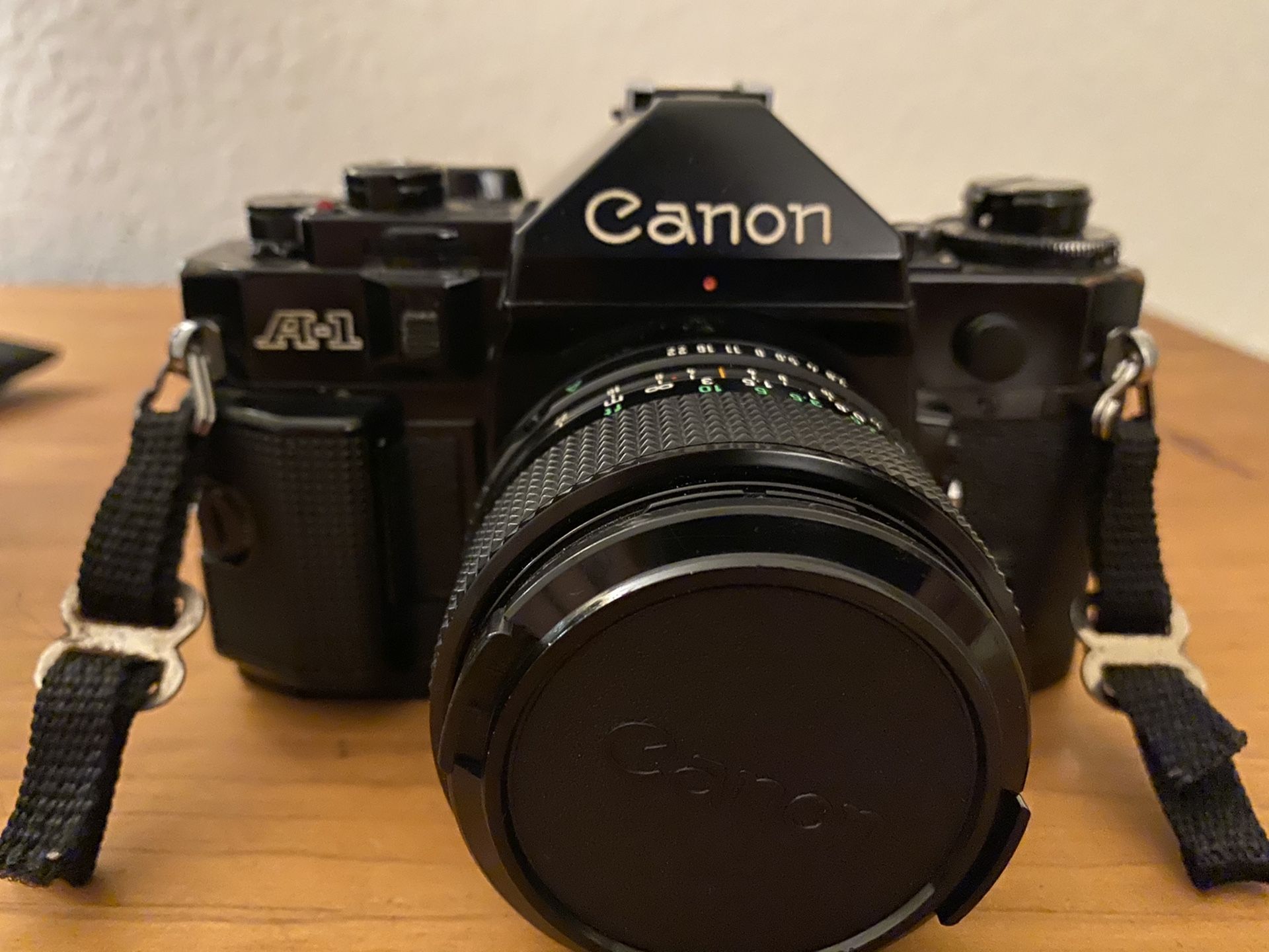 Canon A-1 35mm film camera with 24mm prime lens