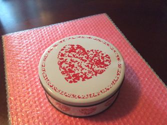 Tin, about 7.25” x 3”