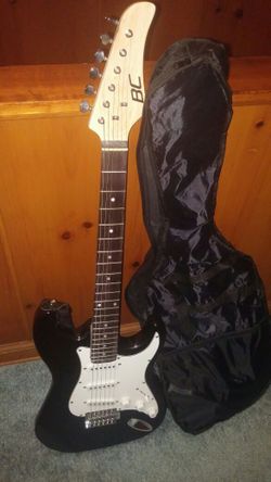 Electric guitar with case