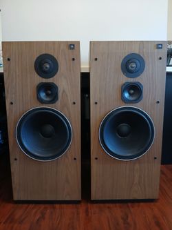 JBL L100T speakers.