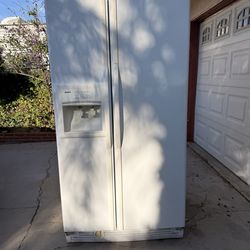 Kenmore side-by-side refrigerator in white