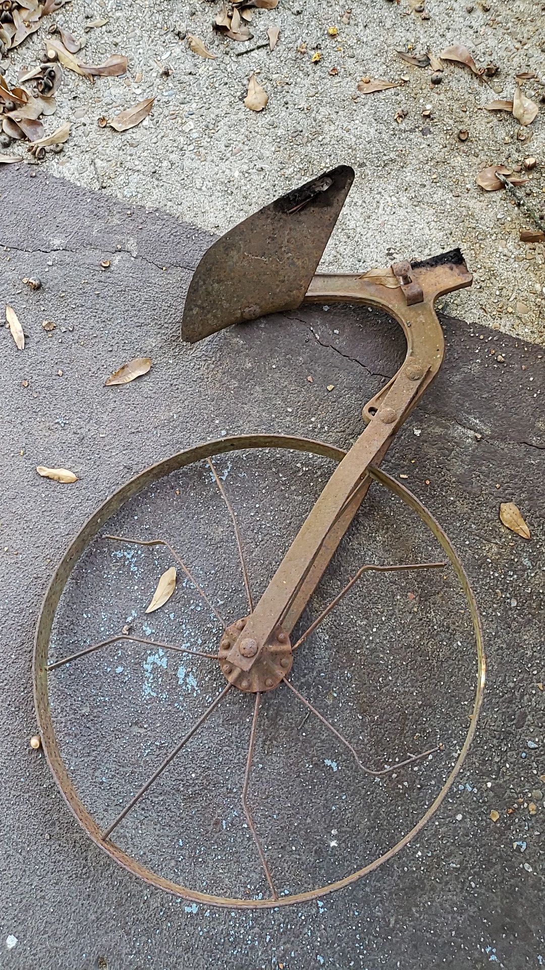Antique plow wheel