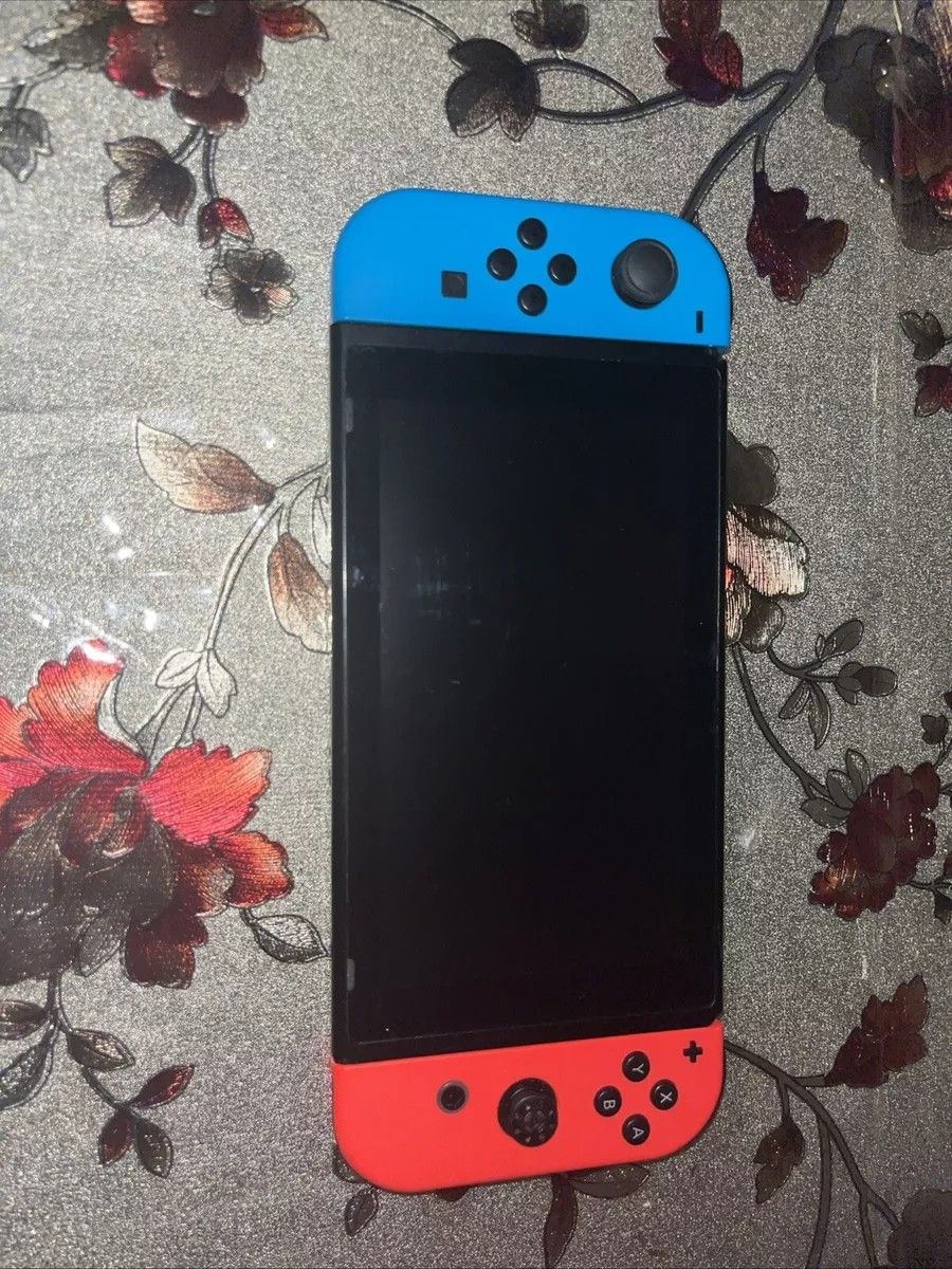 Nintendo Switch 32GB Handheld Console - Neon Red/Neon Blue