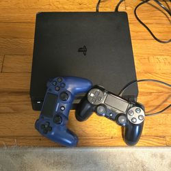 Playstation 4 Slim 1tb with wirless controllers and 19 games