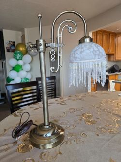 Lamp. Cream-white and bronze-colored. Works very well. I bought it in 1997.   tall 21 .  w 13