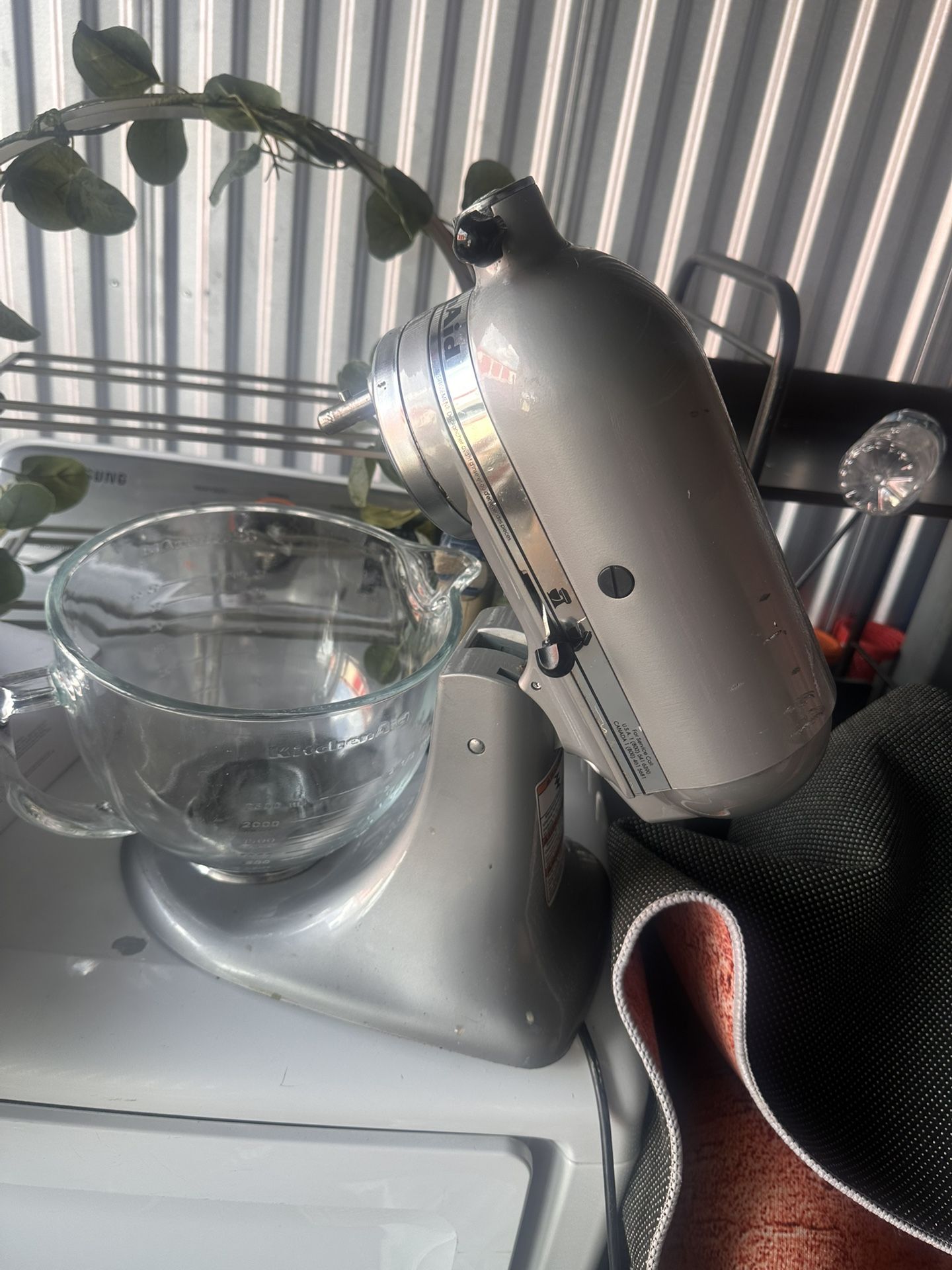 Kitchenaid 5 quart tilt-head stand mixer with glass bowl and flex edge beater. Silver. Marp $899