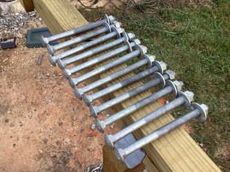 Twelve, large galvanized carriage bolts.