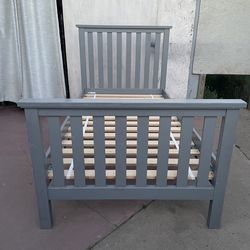 Solid wood twin bed frame in good condition