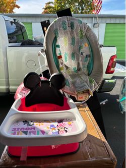 Bouncer and toddler eating chair