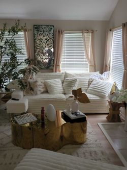 2 Sofas and 2 coffee tables and tv.