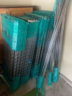Metal storage shelves four total sets