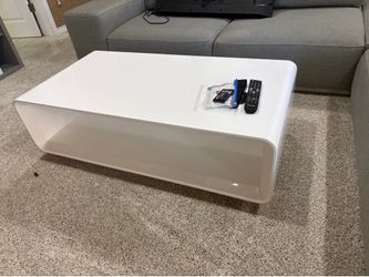 Large and smaller white coffee tables. $29 obo