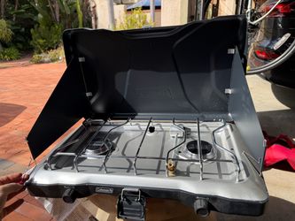 Coleman NIB Camping stove + propane 4 pack