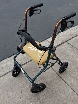 Walker with seat.